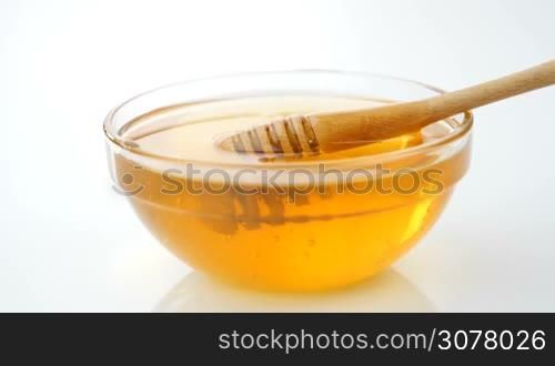 Honey pouring from drizzle into the bowl. Shot at 180fps (VFR) in 60fps. You can Conform to Frame Rate (Interpret Footage) of the clip at 30fps or 24fps for more slow motion.