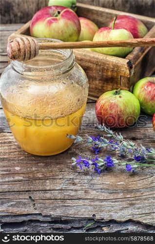 Honey Spas. Still life from the harvest of ripe apples and honey to the Church celebration of the apple feast day.Photo tinted.