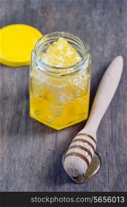 honeycomb and honey in glass jars