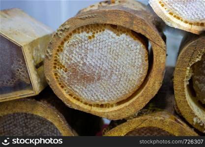 honeycomb from round beehive with sweet honey