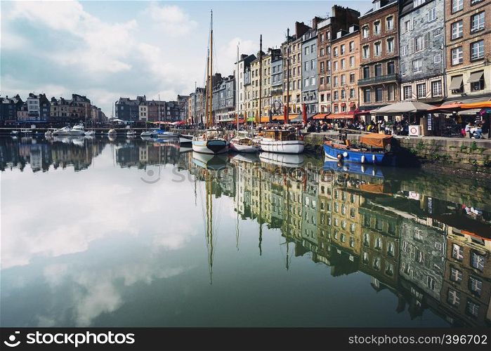 HONFLEUR, FRANCE - APRIL 8, 2018: view of the bay and the embankment in the famous French city Honfleur. Normandy, France