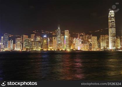 Hong Kong cityscape at night. No brand names or copyright objects.