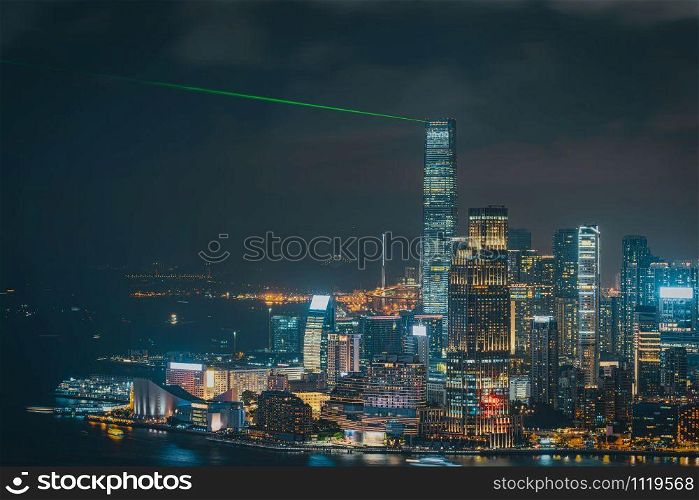 Hong Kong Cityscape skyscraper at twilight time, symphony of lights showing from Kowloon island, Victoria peak and harbour, travel and tourist, Architecture and industrial concept