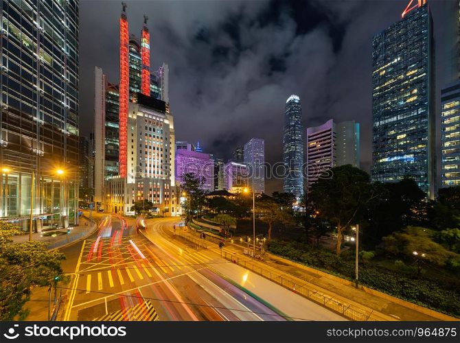Hong Kong Downtown, republic of china. Financial district and business centers in smart urban city in Asia. Skyscraper and high-rise buildings at night.