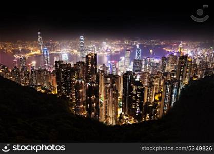 HONG KONG - FEBRUARY 22: Cityscape of Hong Kong island from Victoria peak on February, 22, 2013. The Victoria Harbour is world-famous for its stunning panoramic night view and skyline.