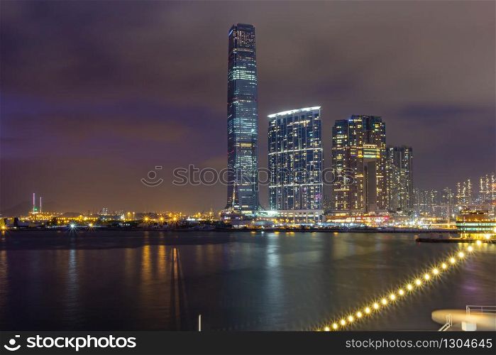 Hong Kong skyline cityscape downtown skyscrapers over Victoria Harbour in the evening. Hong Kong, China
