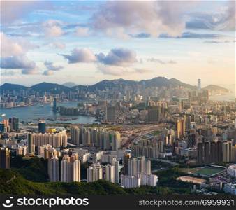 Hong Kong Skyline Kowloon from Fei Ngo Shan hill or Kowloon Viewing Point sunset panorama. Kowloon View point sunset