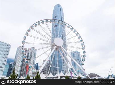 Hong Kong skyline panorama with Ferris wheel.. Hong Kong skyline panorama with Ferris wheel