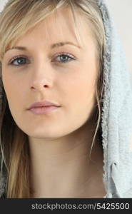 Hooded blonde woman