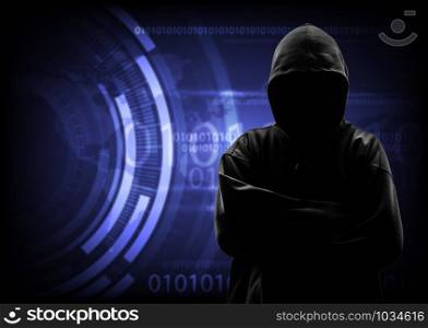 Hooded computer hacker stealing information