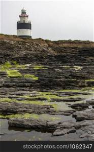 Hook Head. Ireland. 06.09.16. Hook Lighthouse on the rugged Hook Peninsula in County Wexford on the west coast of Ireland. Hook Lighthouse is the oldest working lighthouse in the world.