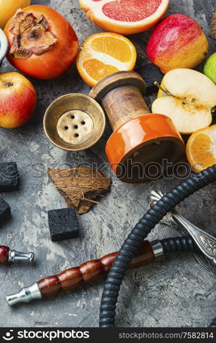 Hookah and fruit smoking tobacco.Smoking hookah for relaxation.. Egyptian fruit shisha tobacco