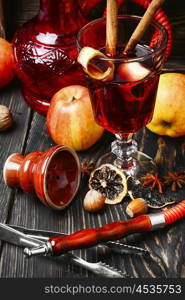 Hookah and mulled wine. Smoking hookah tobacco with apple aroma and stylish Arabic lantern