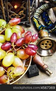 Hookah ,grapes and Arabic lantern
