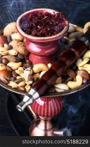 hookah shisha with nut. smoking hookah in Arabic style with the tobacco nut