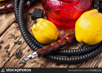 hookah shisha with quince. smoking hookah in Arabic style with the tobacco aroma quince