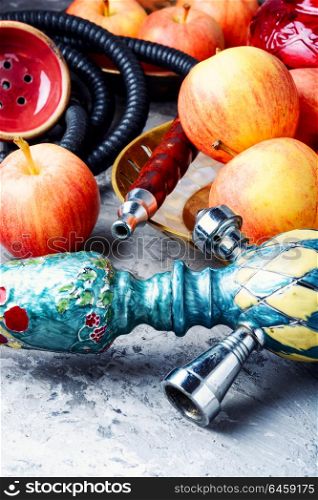 hookah with apple for relax. Smoke hookah with red apple.Shisha concept.Hookah concept
