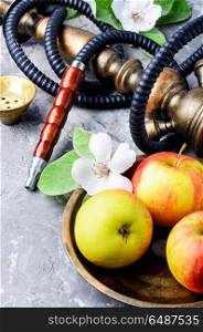 Hookah with apple. Oriental hookah with the aroma apple for relax.Apple shisha.Shisha Concept