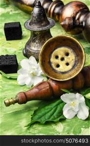 hookah with flavor of Jasmine. Arab shisha tobacco aroma of the Jasmine flower