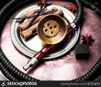 Hookah with spices. Smoking shisha with tobacco aroma of spices.Oriental hookah