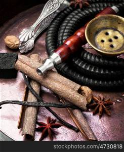 Hookah with spices. Smoking Turkish hookah with a taste of spices, cinnamon, tubby, vanilla