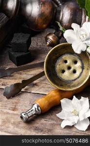 hookah with taste of Jasmine. Arab shisha tobacco aroma of the Jasmine flower