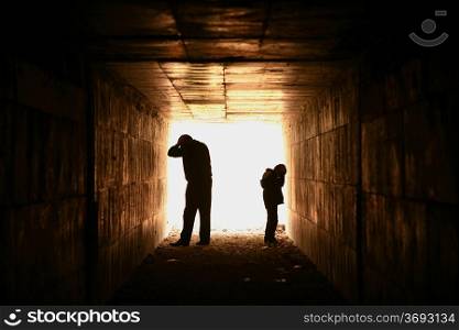 hopeless and helpless father and son in the tunnel&#xA;