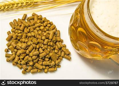 Hops pellets with beer glass