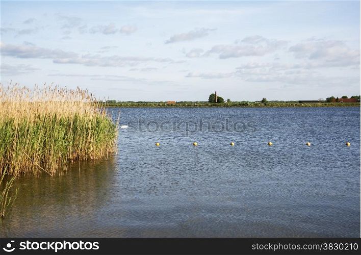 horizon over the dutch landscape with the water nuldernauw