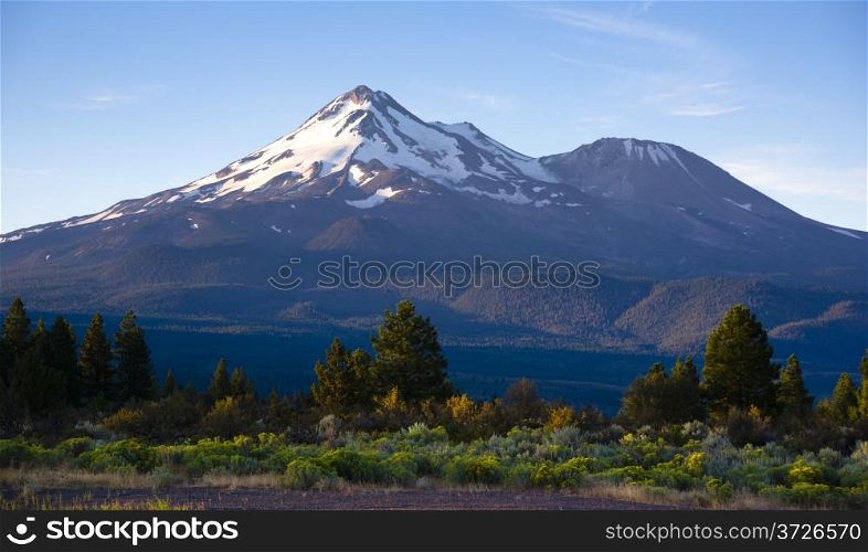 Horizontal composition over sage brush Mt Shasta California