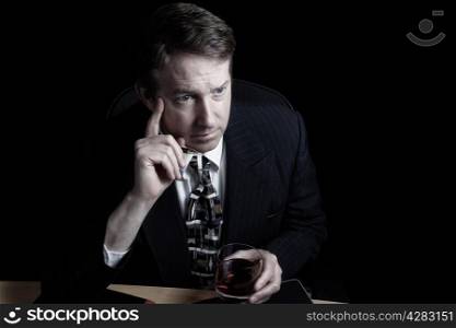 Horizontal image of business man working late with black background