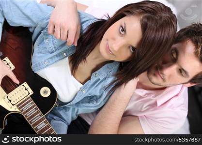Horizontal image of girl with guitar