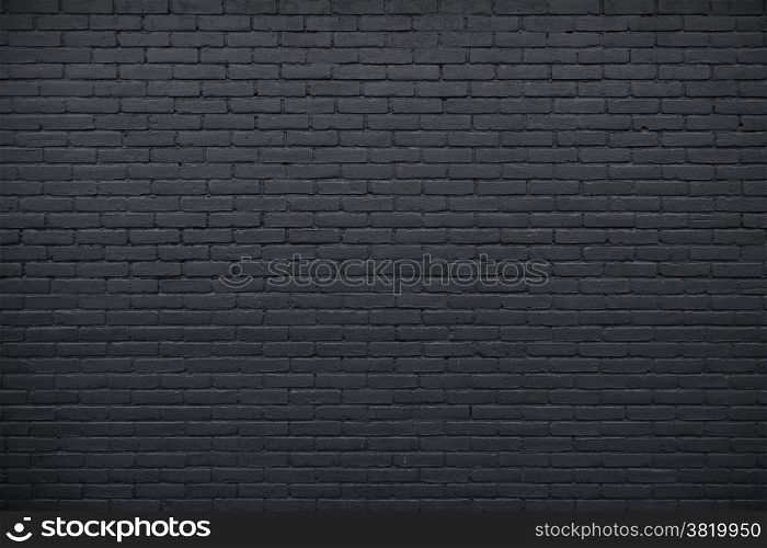 horizontal part of black painted brick wall