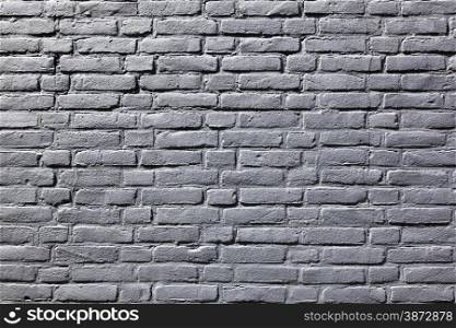 horizontal part of grey painted brick wall