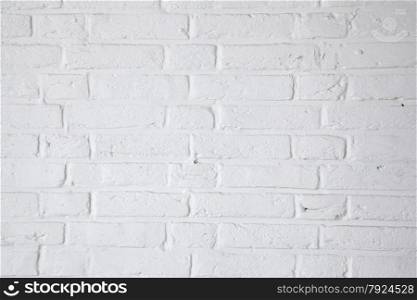 horizontal part of white painted brick wall