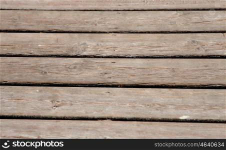 Horizontal photo of a worn down wooden boards