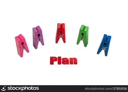 Horizontal photo of large pins, organized as a group, surrounding the word plan isolated on white