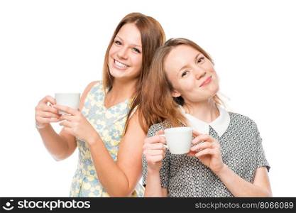 Horizontal portrait of two women with cups of coffee on a white background