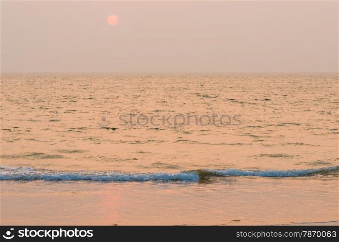 horizontal seascape. the sea and the setting sun
