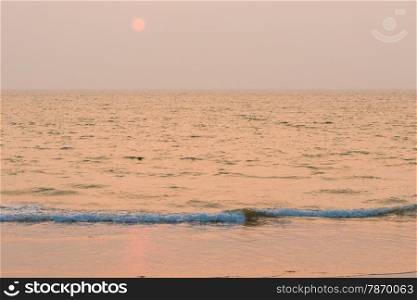 horizontal seascape. the sea and the setting sun