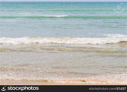horizontal seascape waves on a sandy beach
