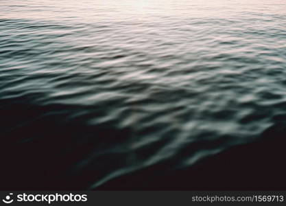 Horizontal shot of black and white pattern in the sea