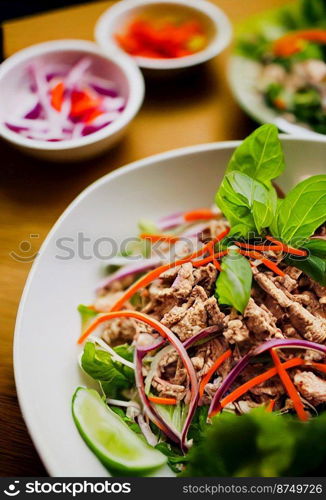 Horizontal shot of delicious larb gai chicken salad 3d illustrated