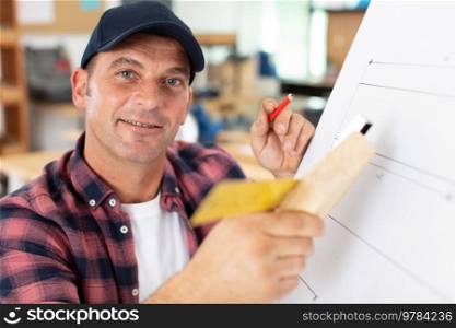 horizontal view of focused carpenter at work