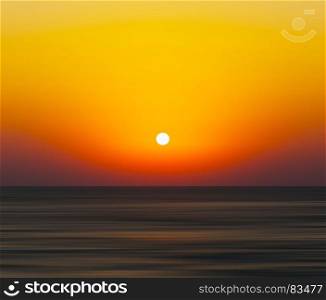 Horizontal vivid orange sunset ocean horizon abstraction blur background backdrop. Horizontal vivid orange sunset ocean horizon abstraction blur ba