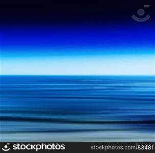 Horizontal vivid vibrant fresh blue ocean landscape motion blur abstraction background backdrop. Horizontal vivid vibrant fresh blue ocean landscape motion blur