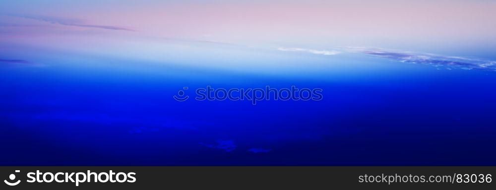 Horizontal wide blue vivid minimal clouds stratosphere background backdrop. Horizontal wide blue vivid minimal clouds stratosphere backgroun