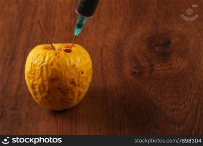 Hormone Apple on the Wood