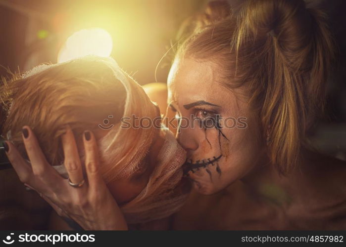 Horrible girl with her boyfriend, zombie halloween theme