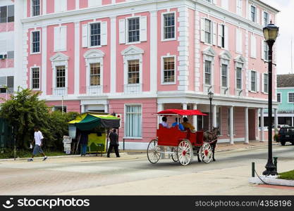 Horse cart moving on the road, Bay Street, Nassau, Bahamas